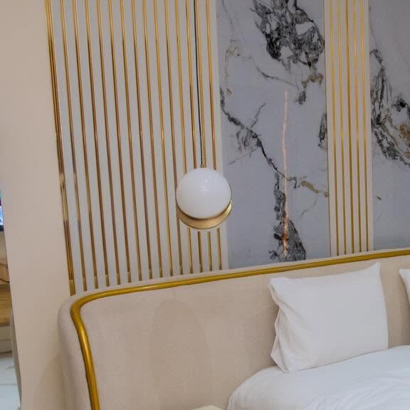 A busy agent making phone calls to negotiate apartment prices.